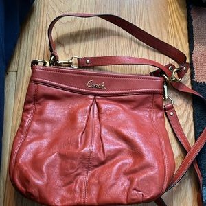 Crossbody coach bag in rusty orange